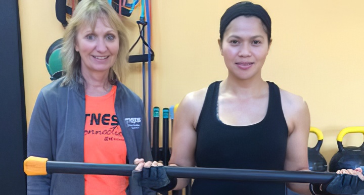 Personal Trainer assistig with Strength Training | Custom Programming